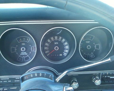 1976 Ford Torino - The interior of a 1976 Ford Torino shows its dashboard with three main gauges and a steering column.