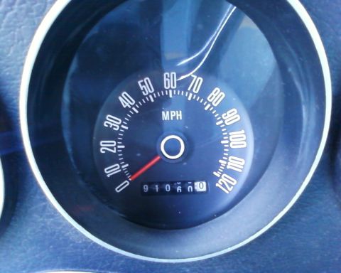 1976 Ford Torino - A close-up of a vehicle's speedometer and odometer.
