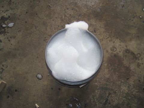 1979 Ford Bronco - Bucket of soapy water on concrete floor, with "SUPERMOTORS" logo visible.