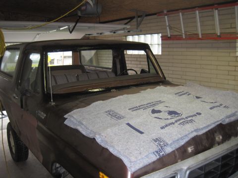1979 Ford Bronco - This 1978 Ford Bronco is in a garage, with its hood covered by a blanket.