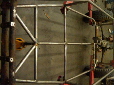 1995 Ford F-150 - A custom buggy frame is shown with suspension parts and tires, indicating a project in progress.