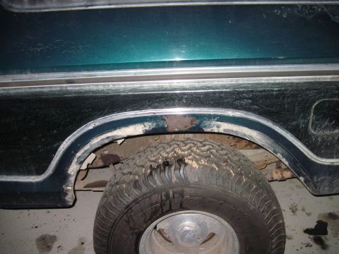 1979 Ford Bronco - Rust is visible around the wheel arch of the vehicle, indicating potential body damage.