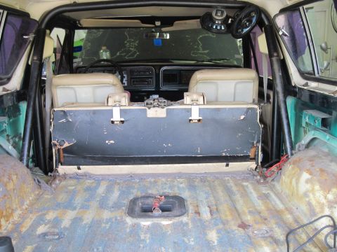 1979 Ford Bronco - Interior view of a 1979 Ford Bronco, including the cargo space and roll cage.