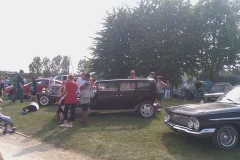 1991 Ford Crown Victoria - An outdoor gathering of people and various vintage automobiles suggests a car show event.