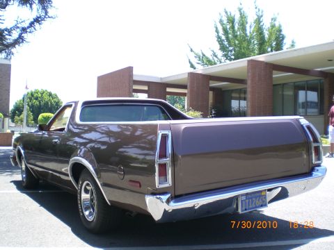 1979 Ford Ranchero - Rear view of a brown 1979 Ford Ranchero pickup truck parked outside a building.