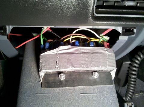 1992 Ford F-150 - Custom wiring installation with a duct-taped component under the dashboard.