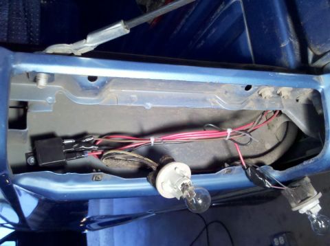 1992 Ford F-150 - This image shows the internal wiring and a light socket assembly of a vehicle, not a complete 1992 Ford F-150.