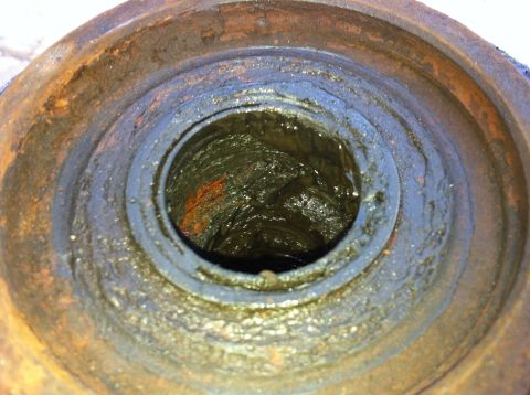 1996 Ford Bronco - Close up of drivers side (bad) spindle.