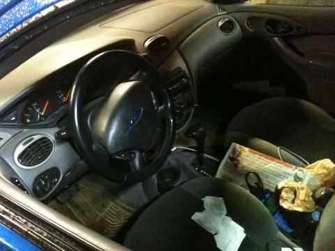 2002 Ford Focus - Interior of a 2002 Ford Focus, the dashboard and driver's seat.