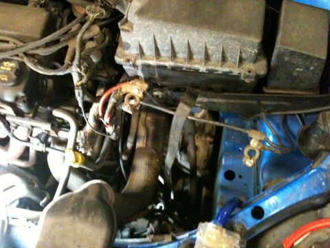 2002 Ford Focus - Close-up view of a car's engine compartment, showing various components and wiring.