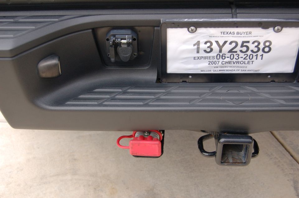 2007 Chevrolet Silverado 1500 rear bumper with trailer hitch, license plate, and electrical connector