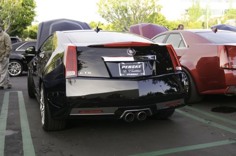 2006 Cadillac STS - Rear view of a black Cadillac CTS, identified by its CTS badging and taillight design, at a car meet.