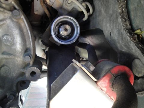 1995 Ford Taurus - This is a close-up view of a steering rack tie rod end connection.