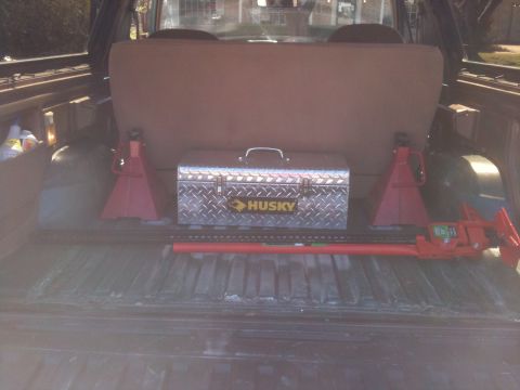 1989 Ford Bronco - Threw in my tool box and HF Farm Jack. Made some mounts out of angle that allow me to lock it down on both sides.