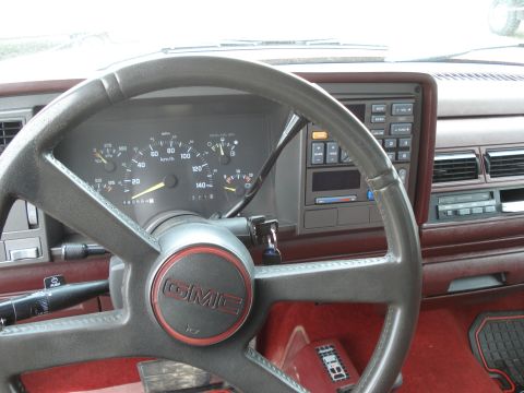 1994 GMC Sierra 3500 - The interior of a 1994 GMC Sierra 3500 shows the dashboard, steering wheel, and gauges.
