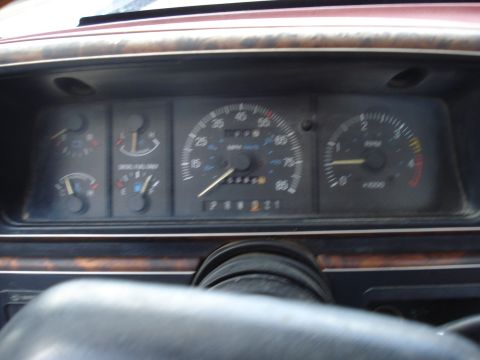 1989 Ford F-250 - Interior view of a 1989 Ford F-250 dashboard, the speedometer, tachometer, and fuel gauges.