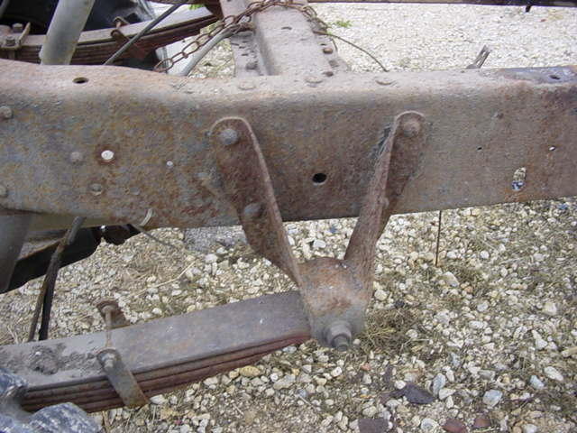 Rusted truck frame and leaf spring assembly