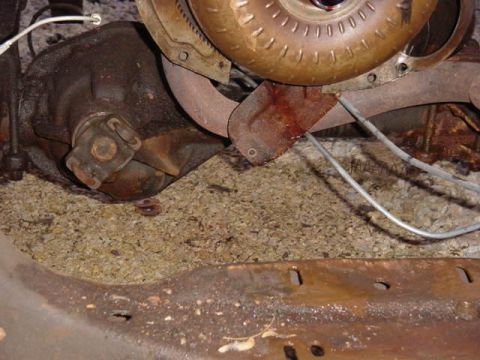 1992 Ford Bronco - This image shows the underside of a vehicle, focusing on the rear axle and drivetrain components.