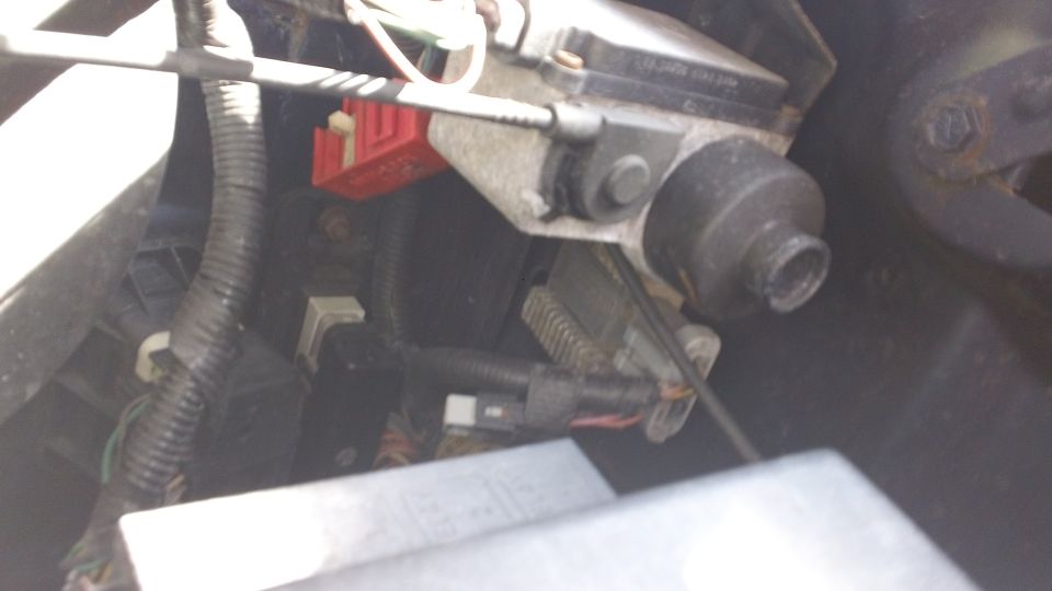 Engine component with red connector and wiring harness