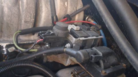 1994 Ford Bronco - Engine bay wiring and electrical components are visible in this close-up view.