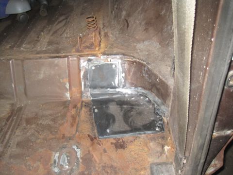 1979 Ford Bronco - This photo shows the interior floor of a vehicle that has undergone rust repair and patching.