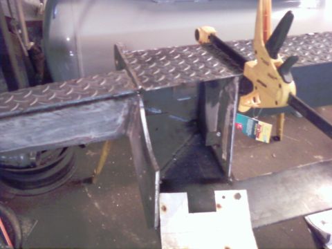 1989 Ford Bronco - Custom metal fabrication part with diamond plate texture is being worked on.