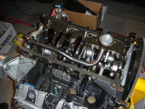 1992 Ford Crown Victoria - Close-up view of an engine's internal components, including the crankshaft and connecting rods, during a rebuild.