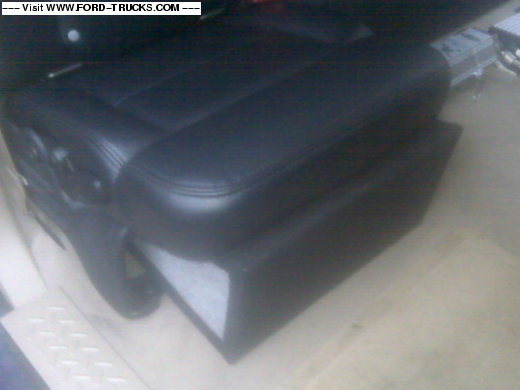 Custom built sub box for jump seat
