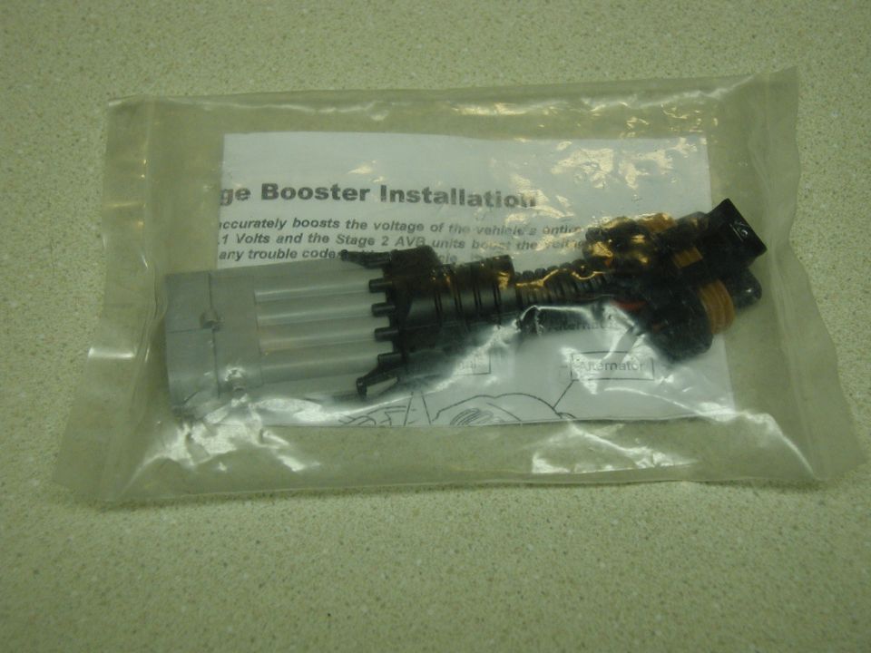 Bagged adjustable voltage booster with finned aluminum body, wiring plug and install sheet