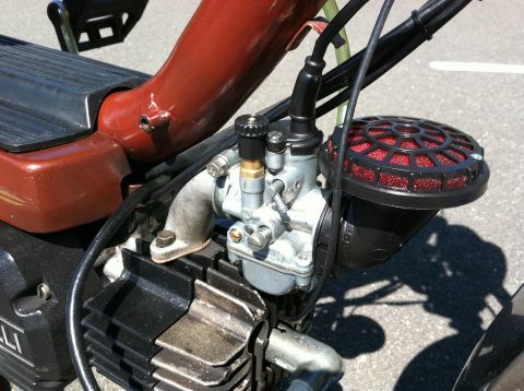 1981 Garelli Rally Sport - A moped's engine components, including the carburetor and air filter, are shown in detail.