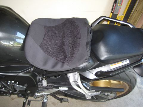 2008 Yamaha FZR1000 - Motorcycle seat with a black mesh cover and a key hanging from the ignition.