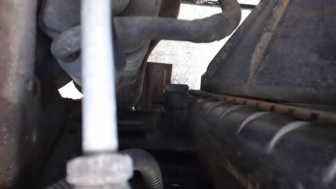 1994 Ford Bronco - Close-up view of radiator and hoses, likely from an older vehicle.