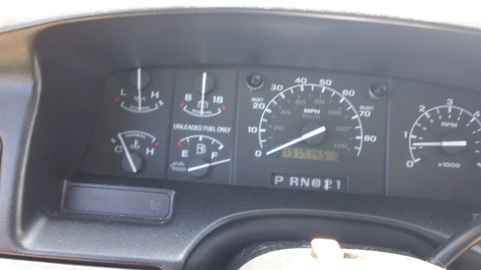 1994 Ford Bronco dashboard gauges showing speed, RPM, fuel, and temperature