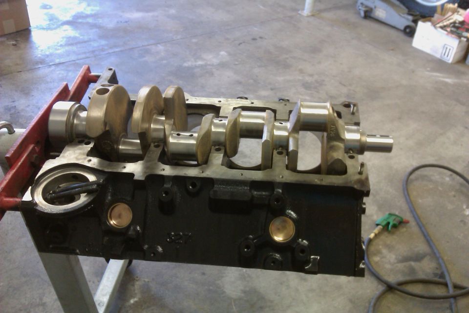 engine block on stand with crankshaft installed