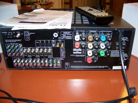 1992 Jeep YJ - The rear panel of an Onkyo audio receiver displays a complex array of connection ports for audio and video components.