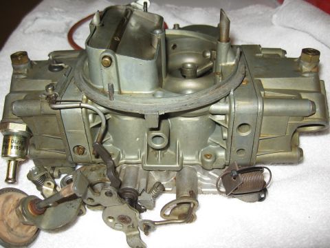 1968 Shelby GT500 - A Holley carburetor is shown, with a visible Autolite sensor and linkage assembly.