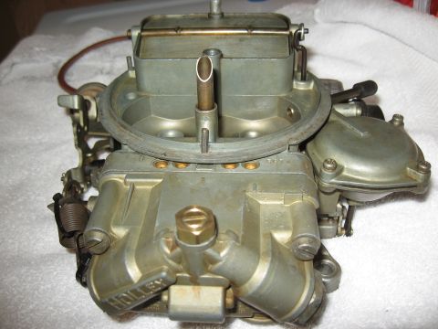 1968 Shelby GT500 - Close-up of a Holley carburetor, a key component in many older vehicles.