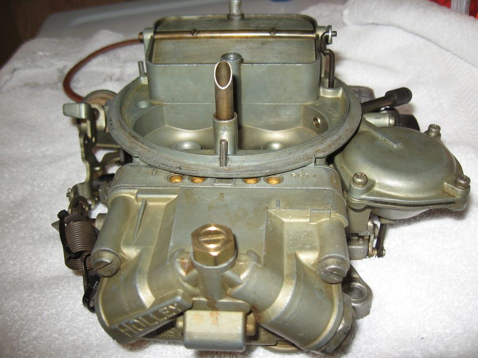 Holley carburetor with visible model numbers and "Holley" branding