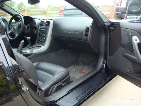 2006 Chevrolet Corvette - Interior view of a 2006 Chevrolet Corvette, highlighting the dashboard and driver's seat.
