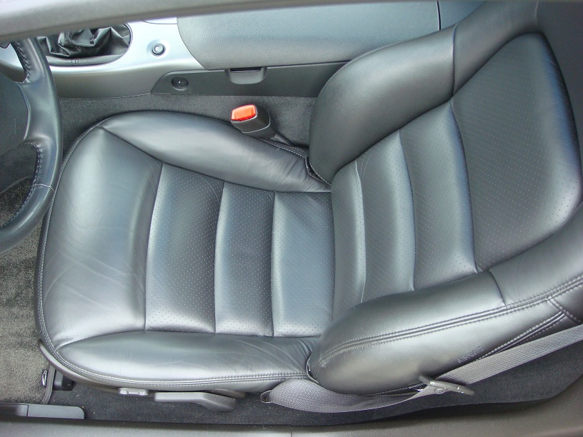 Black perforated leather interior with seatbelt
