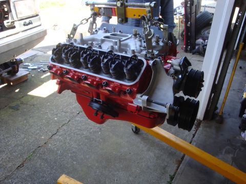 1989 Ford Bronco - V8 engine being worked on, mounted on an engine stand.