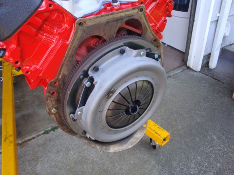 1989 Ford Bronco - Close-up view of a vehicle's engine clutch assembly, mounted on a stand.