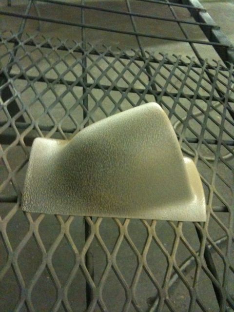 1996 Ford Bronco - Tan plastic gauge pod sits on a metal grate.