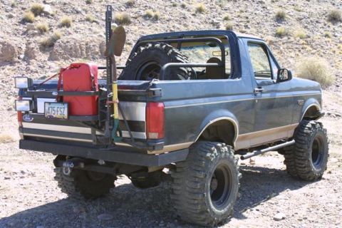 1994 Ford Bronco - Modified 1994 Ford Bronco equipped for off-road use, a rear-mounted spare tire and fuel can.