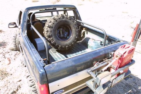 1994 Ford Bronco - This 1994 Ford Bronco is equipped for off-road adventures with a spare tire and a jerry can mounted on the rear.
