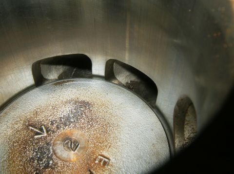 2000 Ford E350 - Interior view of an engine cylinder, showing wear and casting marks.