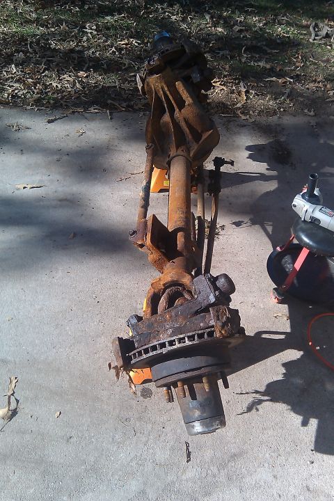 1996 Ford Bronco - Front axle assembly with brake rotor and hub, appears to be removed from a vehicle.
