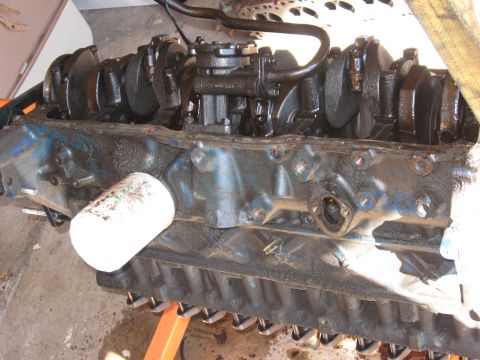 1981 Ford Bronco - Engine block with crankshaft and oil filter is visible, mounted on an engine stand.