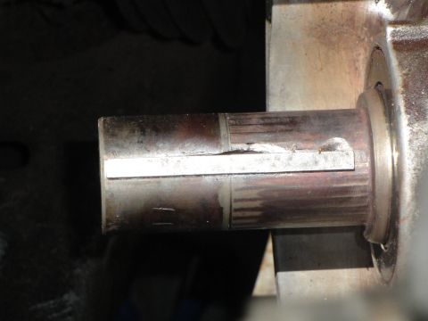 1995 Ford Taurus - Metal shaft with a keyway, likely a component from industrial equipment.
