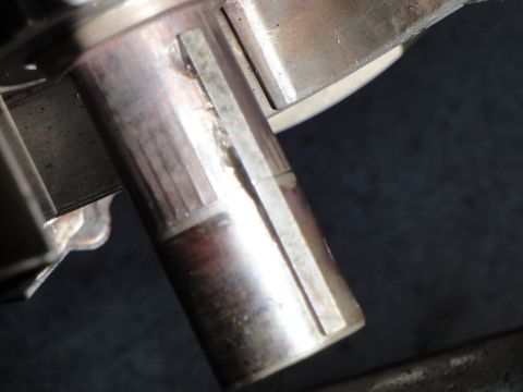 1995 Ford Taurus - Close-up of a metal shaft with a keyway, showing signs of wear.